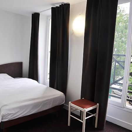 Hotel De La Tour Paris Quarto foto