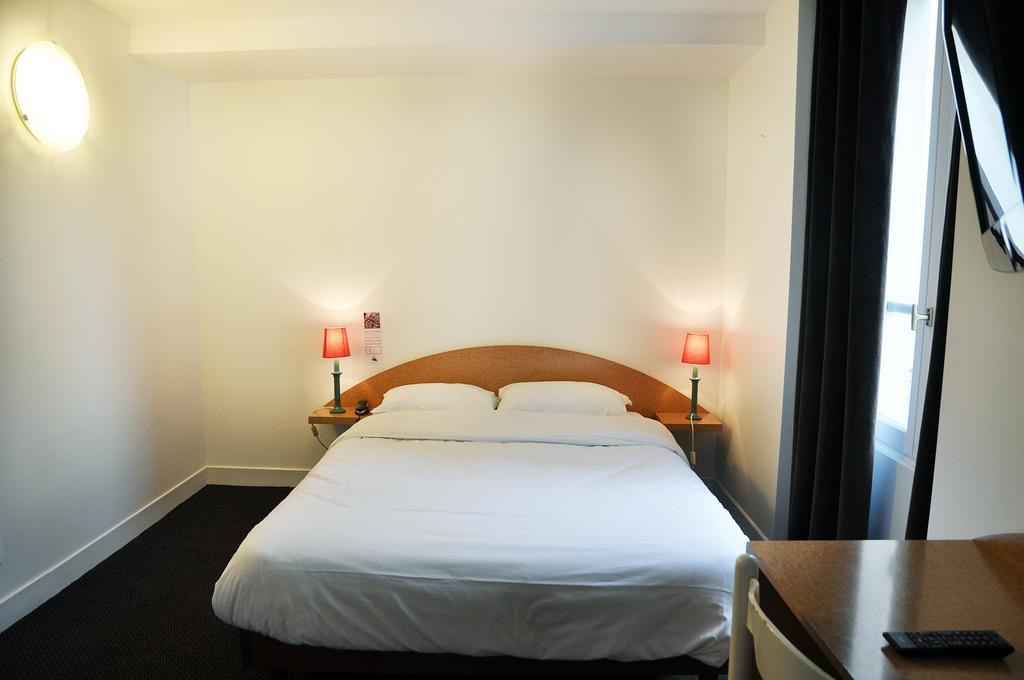 Hotel De La Tour Paris Quarto foto